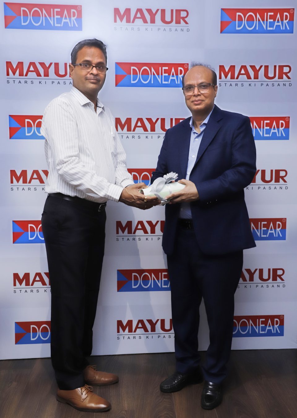 DONEAR GROUP ACQUIRES MAYUR BRAND
